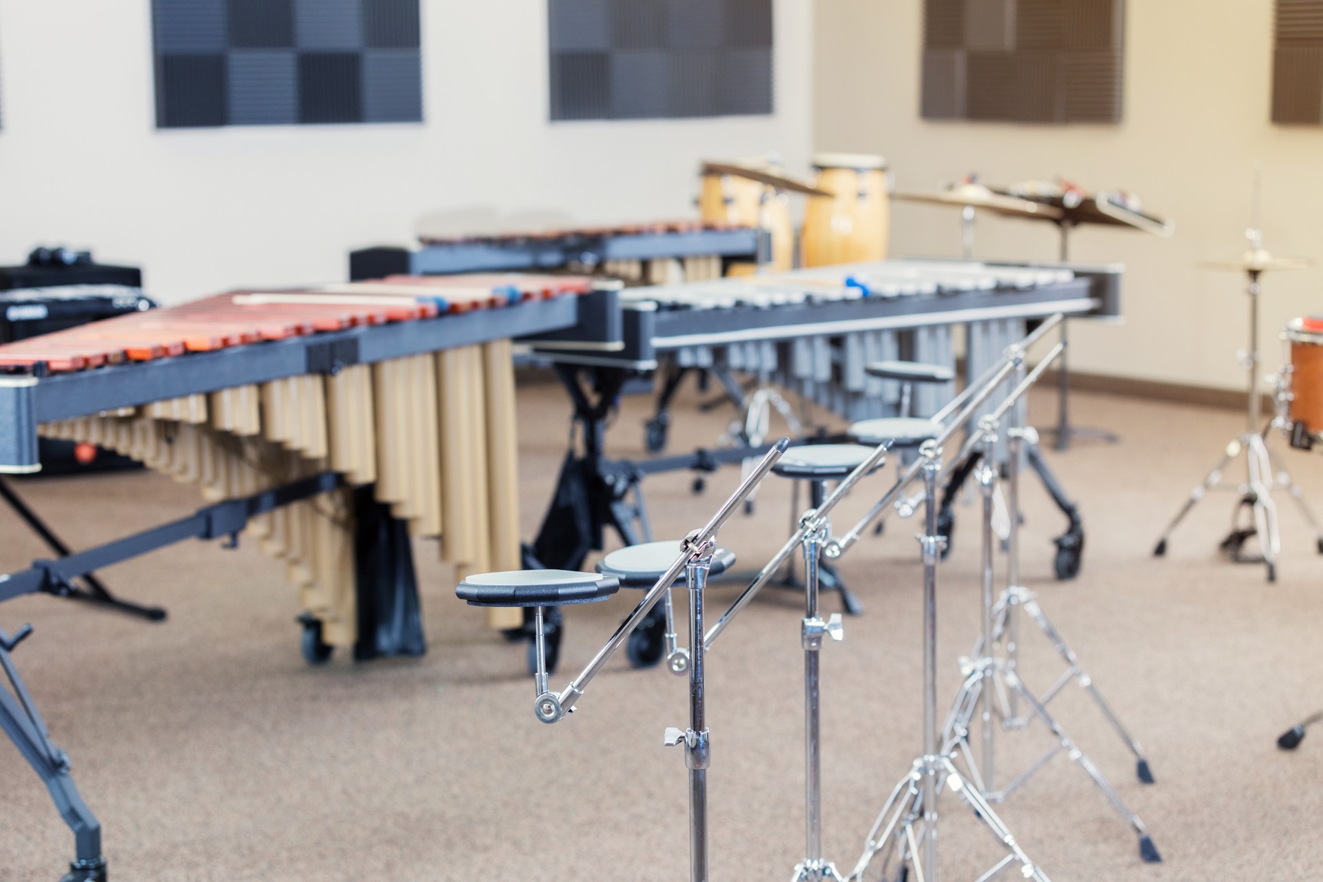 Still life photo of percussion instruments in a high school band room